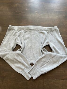 2000s inspired fall off the shoulder garage sweater